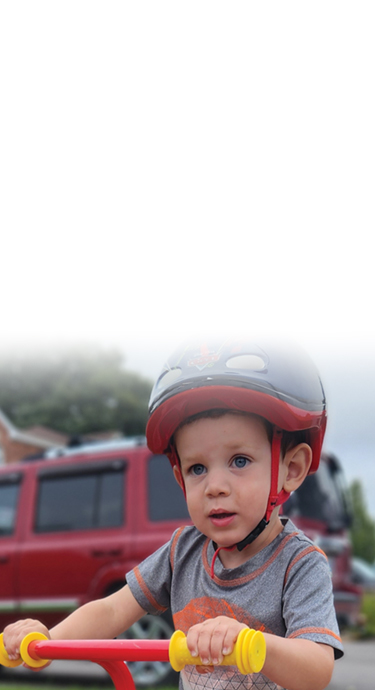 SickKids patient Jayden on his bike
