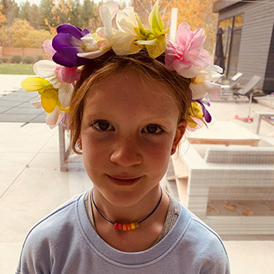 SickKids patient Hunter with a flower crown